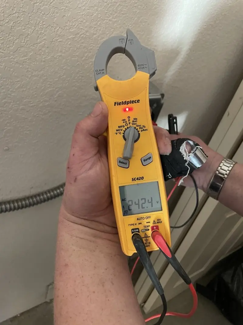 Voltage testing with clamp meter during Generator Installation in Visalia